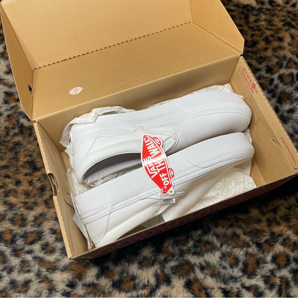 Brand new white slip on vans